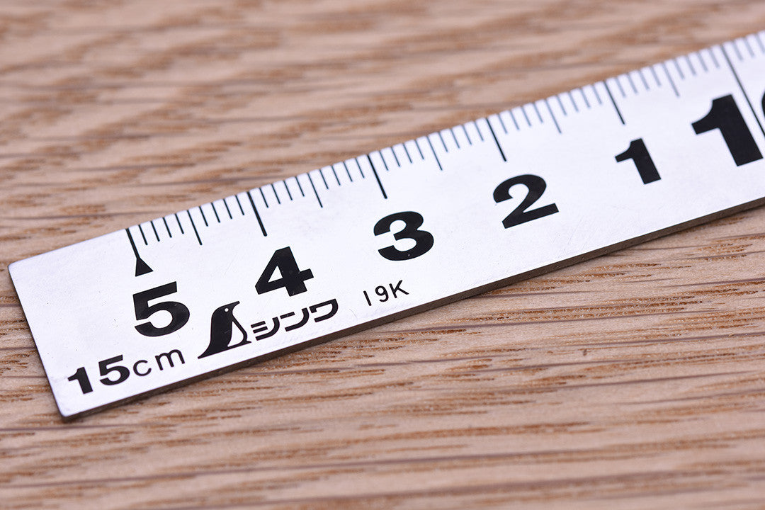 https://cdn11.bigcommerce.com/s-vao5inanlp/images/stencil/original/products/8379/10493/shinwa-carpenters-square-with-metal-stopper-150mm-close-up-end-224482__56590.1691406100.1280.1280__06216.1751277324.jpg?c=1